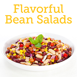 A bowl of assorted beans on a white background