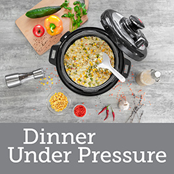 Overhead view of a pressure cooker and meal preparation items