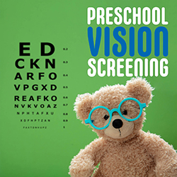 A teddy bear wearing glasses next to an eye chart in front of a green background