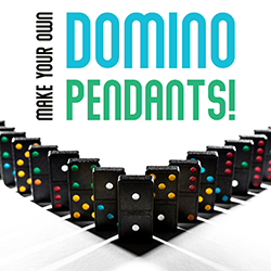 black dominoes with colorful spots on a white background