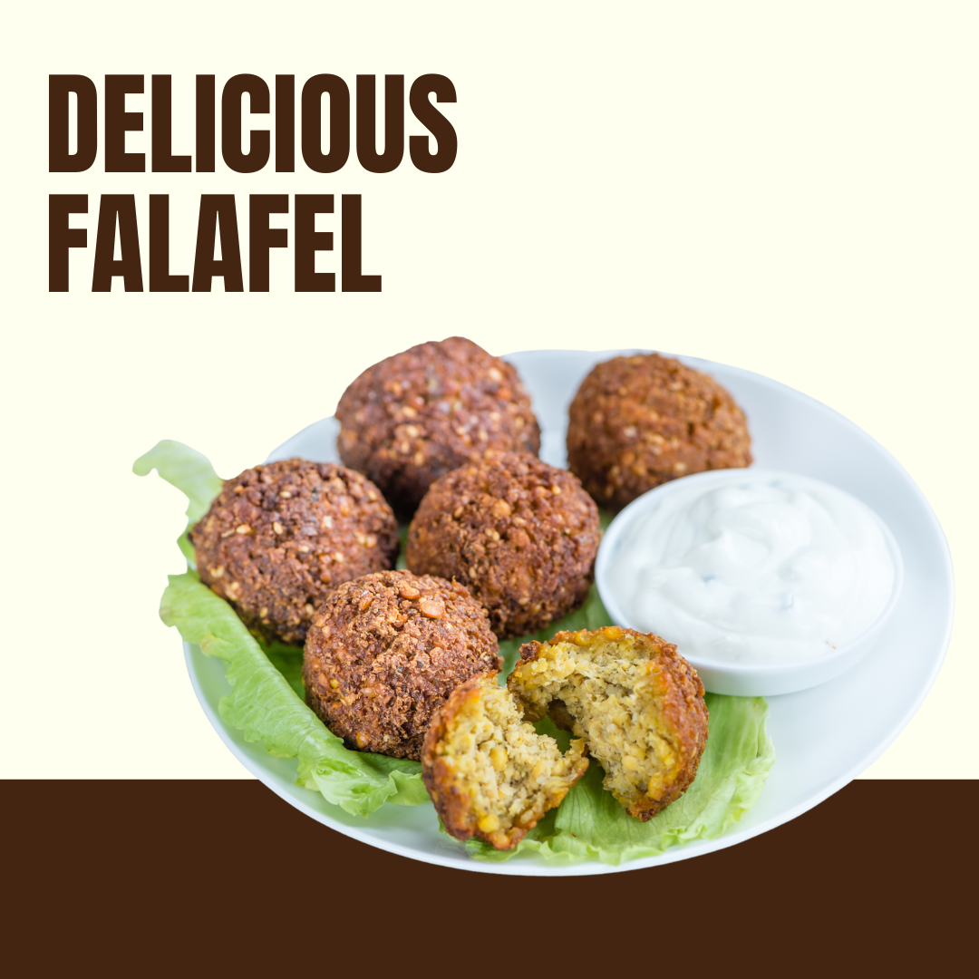 plate of falafel on lettuce garnish with side of white dipping sauce