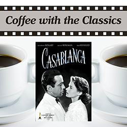 Casablanca poster over cups of coffee on a white background