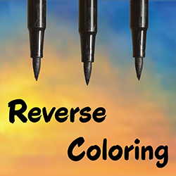 black markers on a orange, yellow, and blue background