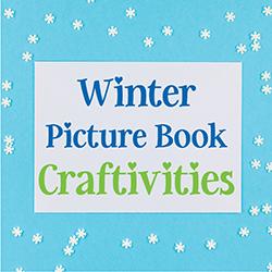 Image of paper snowflakes on blue background