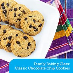 A plate of fresh chocolate chip cookies