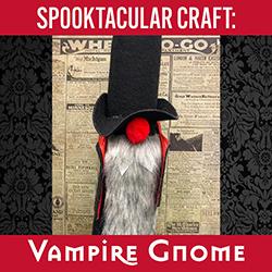 Vampire Gnome craft in front of a gothic newspaper and black damask background