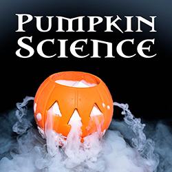 A jack-o'lantern with smoke pouring out of its face surrounded by smoke on a dark background