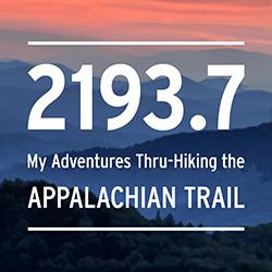 2193.7: My Adventures Thru-Hiking The Appalachian Trail n white in front of a series of blue mountain ridges