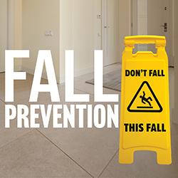 A home interior tile floor with a falling hazard sign and Fall Prevention in white