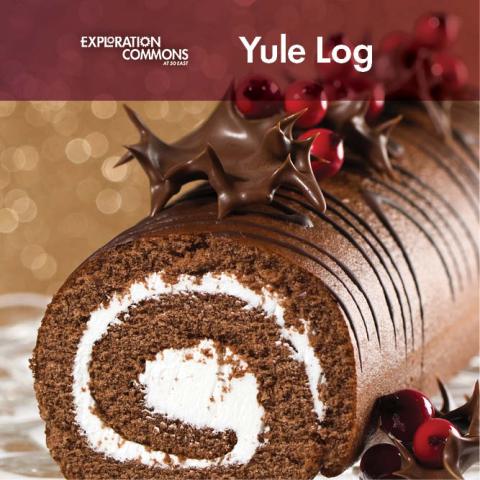 Dessert yule log with chocolate cake and whipped cream filling. Text: Yule Log