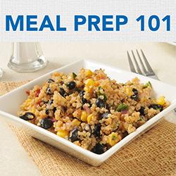 A Black Bean-Quinoa meal in a white square bowl on a burlap placemat.