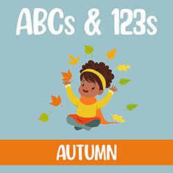 child playing in leaves