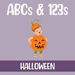 child dressed in a pumpkin costume