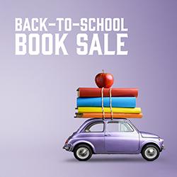 a miniature car with books on top