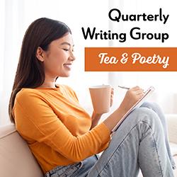 a woman writing and drinking a cup of tea