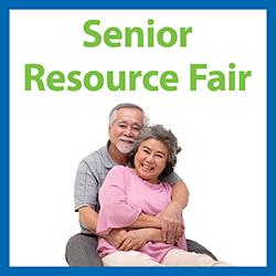 2 seniors holding each other