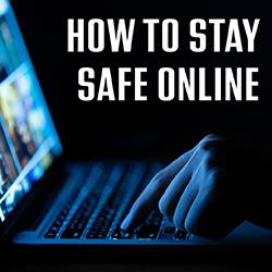 a person using a laptop in the dark