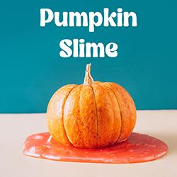 a small pumpkin on top of a puddle of slime