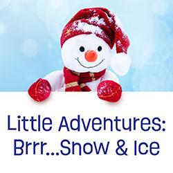 a snowman holding a sign