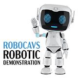 A small white robot with big dark blue eyes waving at the camera.