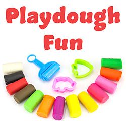 multicolored pieces of playdough and cookie cutters and a roller