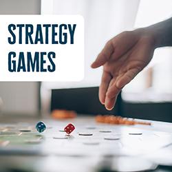 Hand hovering over a board game with dice mid-roll and the text "STRATEGY GAMES".