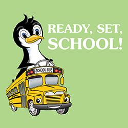 Corky the Penguin driving a school bus