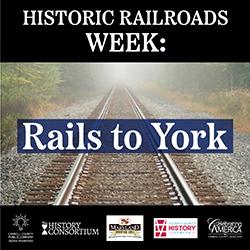 Image of railroad tracks disappearing into the fog