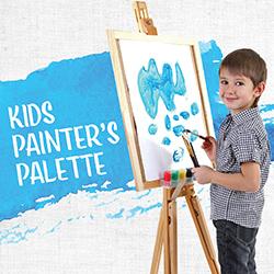 Little boy standing in front of an easel holding a canvas with blue paint on it