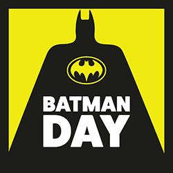 A black Batman silhouette over a yellow background with Batman Day text in white