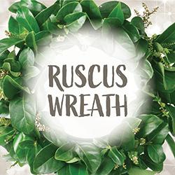 A Ruscus Wreath made of braided leaves instead of pine