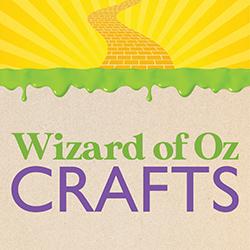 A sunburst yellow brick road with a witches' slime bar below over kraft paper.