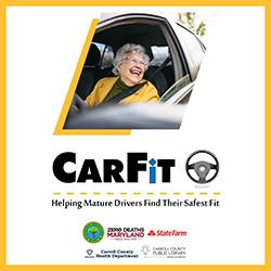 smiling elderly person in a car