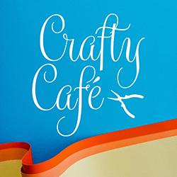 Blue paper background with a swirl of orange and tan paper in the front.