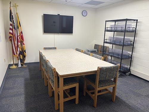 Small Meeting Room in default configuration with a table and 8 chairs